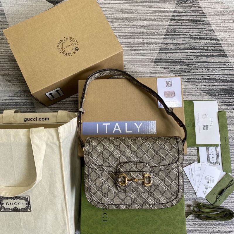 G*u*i top handle bags
